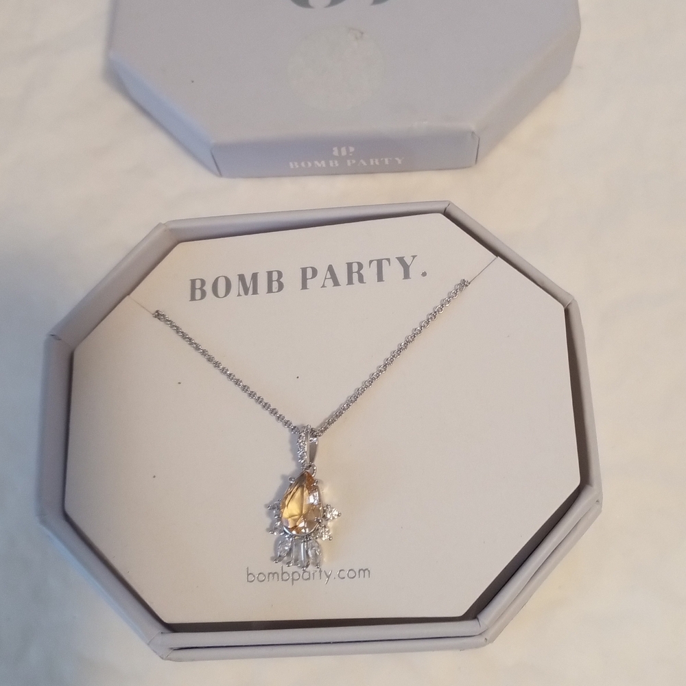 Brand RBP Necklace 20" Woman's Necklace. The Stone is a lab created peach topaz